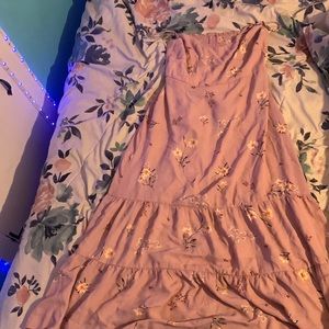 A pink dress with flowers